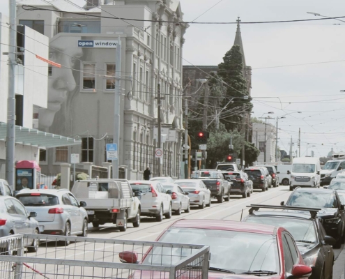 Description: Photo of a vacant residential block with temporary fence erected at the footpath. AS Planning are Town Planners in Victoria.